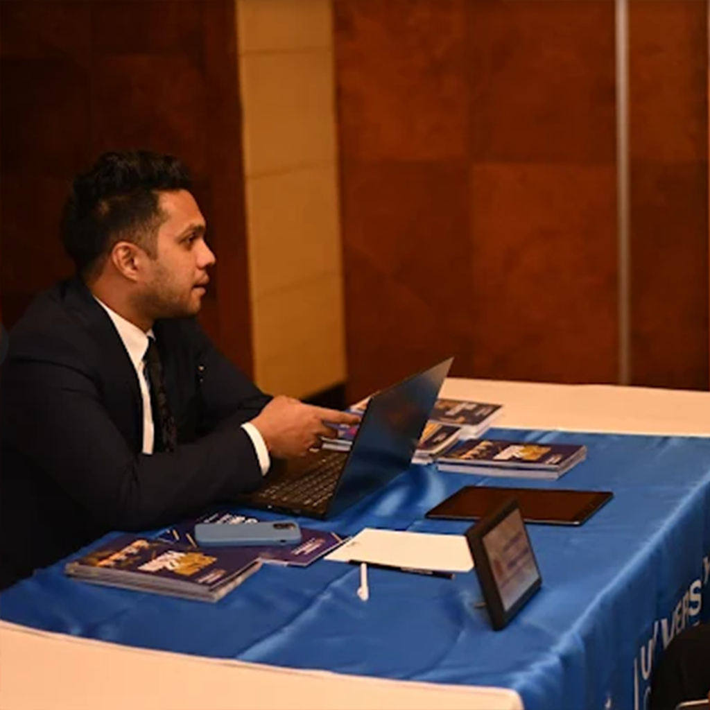 Corporate professionals in seminar room